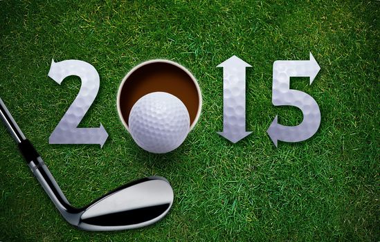 Happy New Golf year 2015, Golf ball and putter on green grass, the same concept available for 2016 and 2017 year.