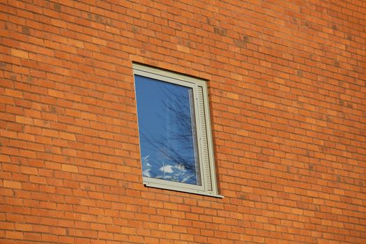 Brick wall with a window