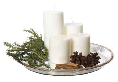 Christmas Plate with candles isolated on white background