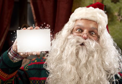 Happy Santa Claus with greeting cards, copy space
