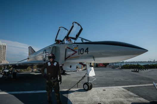 Jet 104 on carrier San Diego USS Midway Deck