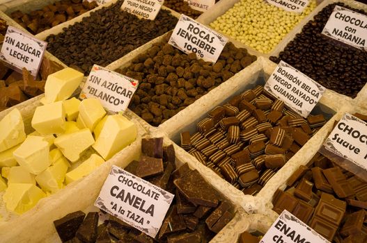 Market stall displaying a wide range of chocolate