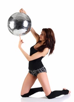 Girl holding disco ball isolated on the white background