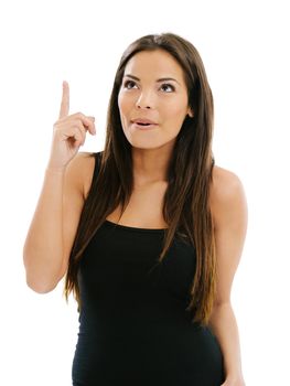 Photo of a beautiful young female pointing up with one hand.
