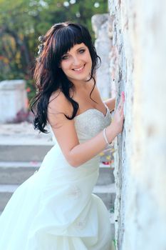 Girl in a weeding dress looking at camera