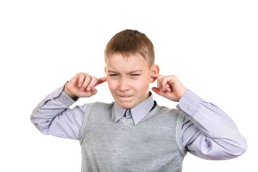 Displeased Boy covering his Ears from the Noise. Isolated on the White Background