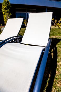 Detail of a deckchair near the swimming pool