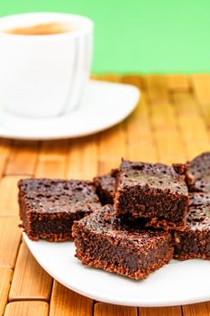 Chocolate brownies with coffee, selective focus