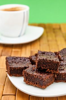 Chocolate brownies with coffee, selective focus