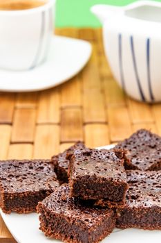 Chocolate brownies with coffee, selective focus