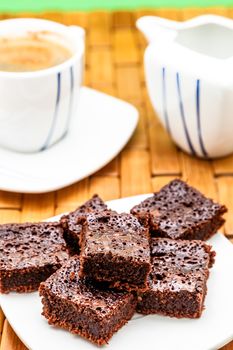 Chocolate brownies with coffee, selective focus
