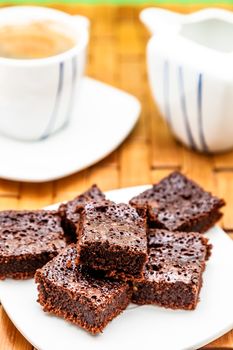 Chocolate brownies with coffee, selective focus