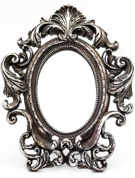 Fantastic vintage silver-plated mirror on a white background