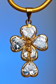 Pendant of a crucifix with five zirconia enchased