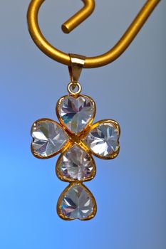 Pendant of a crucifix with five zirconia enchased