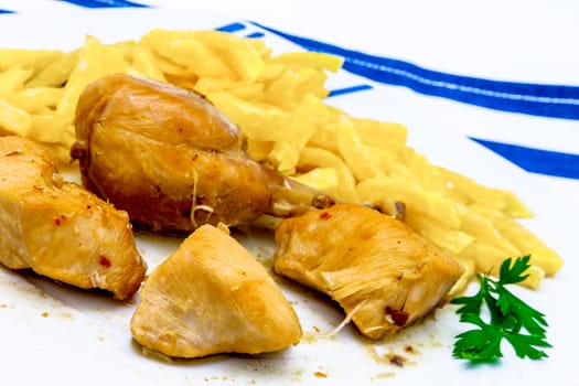 A dish of chicken with potatoes