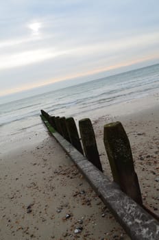 Wood sea defence along Worthing beach in Sussex,England.