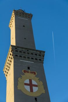 lantern of Genoa and a jet at high altitude