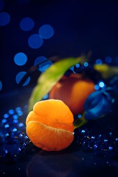 Tangerines on a dark blue background - New Year