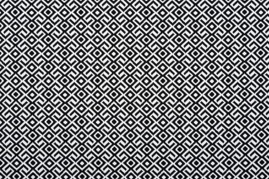 Material in geometric patterns, a textile background.