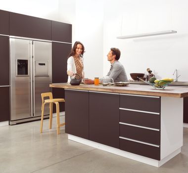 couple in the modern kitchen interior design photo
