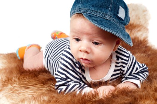 Shot of newborn baby lying on fur