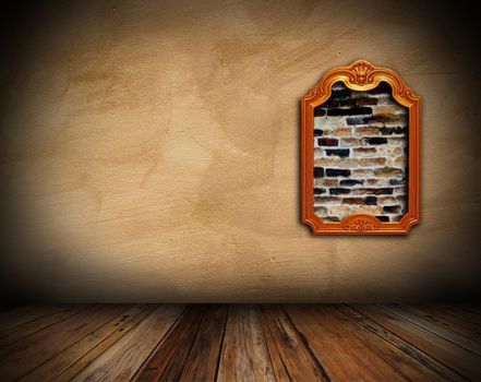 interior background with art frame on wall revealing the bricks structure