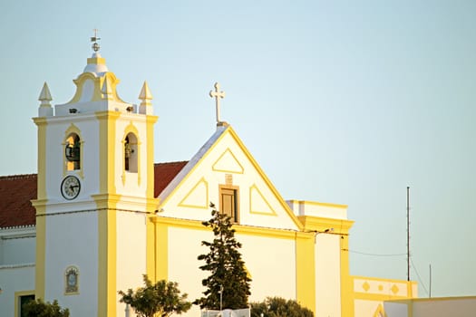 Church from Ferrragudo at sunset in Portugal