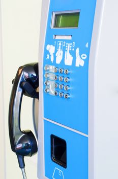 Shot of blue public card telephone, telecommunications