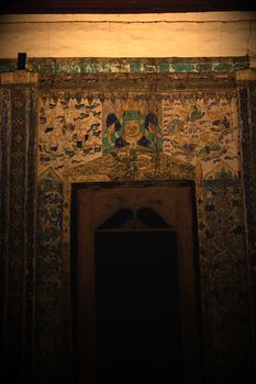 Public mural painting at old temple in Thailand