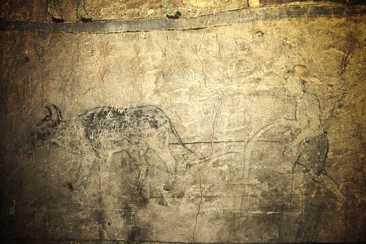 Public mural painting at old temple in Thailand