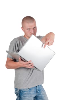 Man in casual clothes pointing the finger at laptop