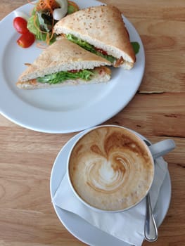 tuna sandwich and latte coffee