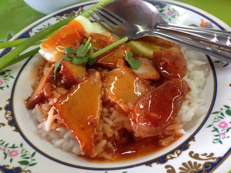 red sliced pork with sweet sauce , thai food