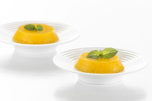 Quindim is a Brazilian Coconut Flan dessert made with egg yolks and coconut. 