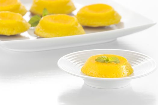 Quindim is a Brazilian Coconut Flan dessert made with egg yolks and coconut.