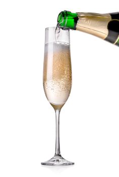 Champagne pouring in a glass isolated on white