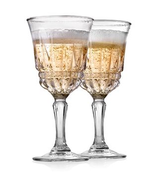 Goblets of champagne isolated on a white background