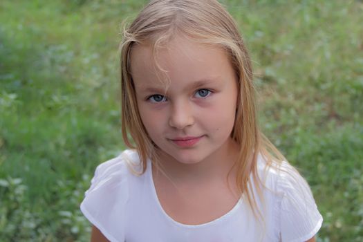 Portrait of beautiful girl with blue eyes