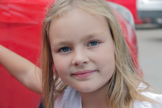 Portrait of beautiful girl with blue eyes
