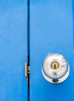 Stainless handle on blue wooden door2