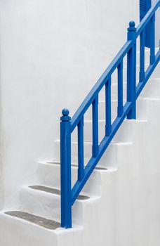 Blue handrail with white stairs2