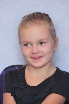 Portrait of beautiful girl with blue eyes