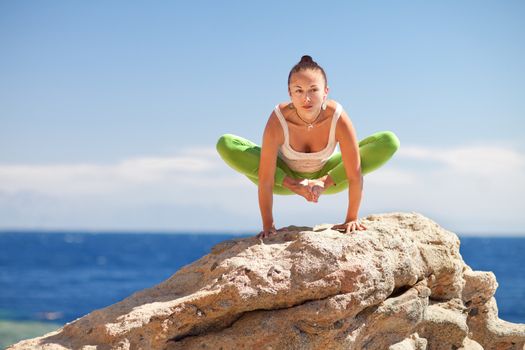 yoga on the mountain by the sea