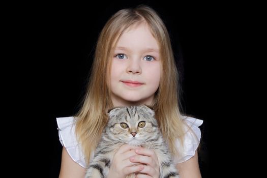 Portrait of beautiful girl with grey kitty