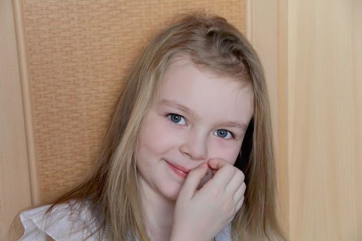 Portrait of beautiful girl with blue eyes