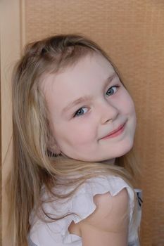 Portrait of beautiful girl with blue eyes