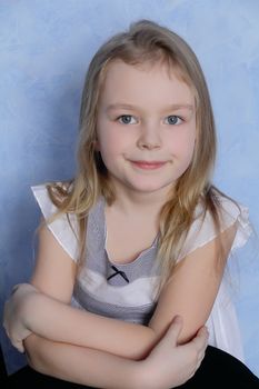 Portrait of beautiful girl with blue eyes