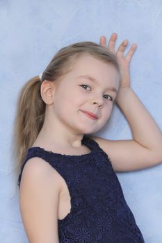 Portrait of beautiful girl with blue eyes