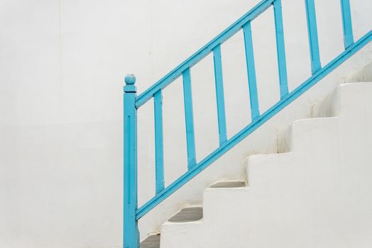 Blue handrail with white stairs1